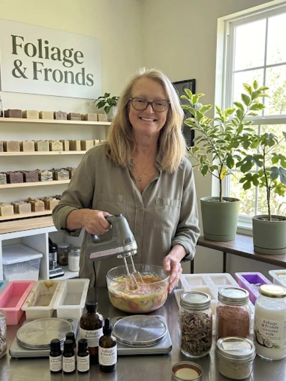 The maker of Foliage & Fronds whipping a batch of soap in her studio